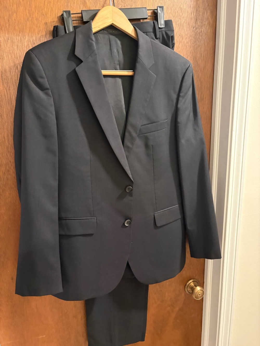 Hugo Boss Men's Black 2 Piece Two-Button Suit with pants.